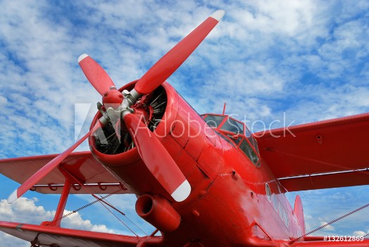 Picture of Red airplane biplane with piston engine